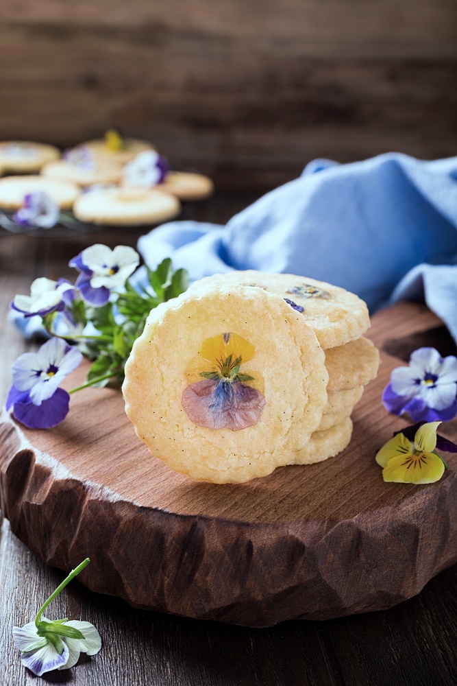 Homemade shortbread cookies with edible violets